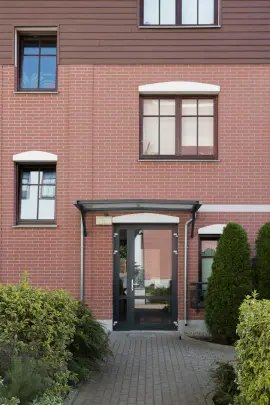 Zdjęcie wejścia do budynku w inwestycji Garden House